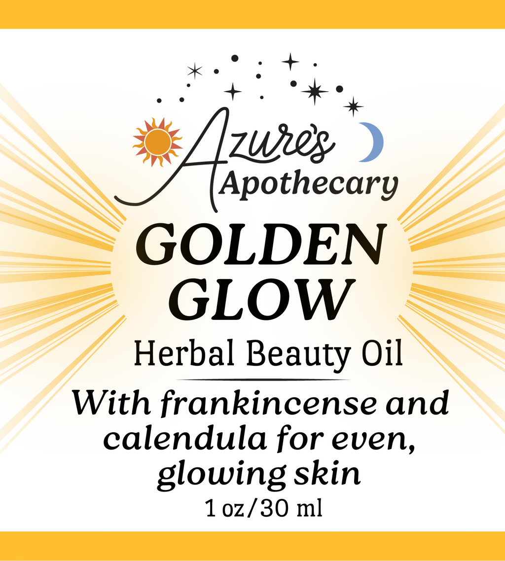 A square product label for Azure's Apothecary Golden Glow Herbal Beauty Oil, featuring a yellow and white design with a sunburst graphic, ingredients list, suggested use, and social media details.